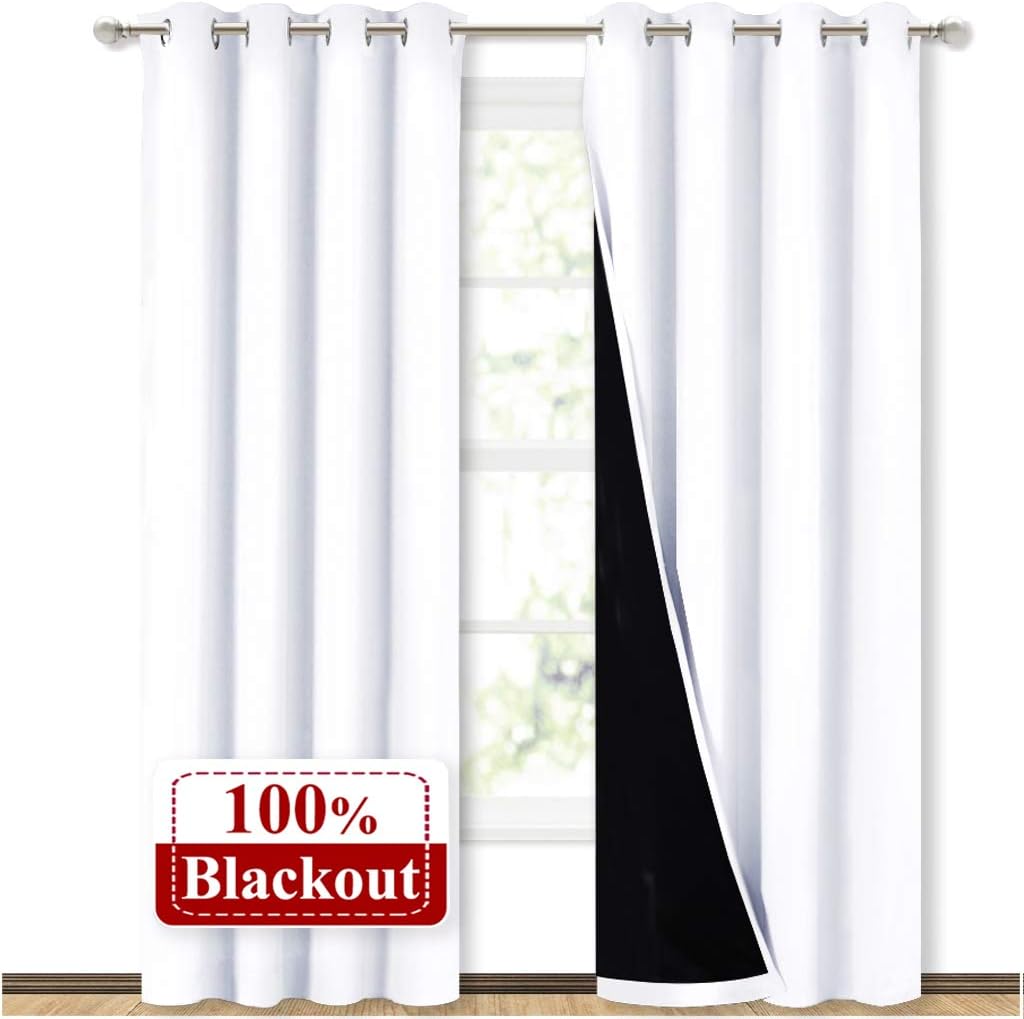 NICETOWN 100% Blackout Window Curtain Panels Cold and Full Light Blocking Drapes with Black Liner for Nursery 84 inches Drop Thermal Insulated Draperies White 2 Pieces 52 Wide Each Panel