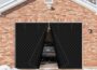 Magnetic thermal insulated garage door curtain for winter, black quilted panels opening on brick garage with car inside and snow outside