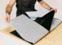 HSS EPDM Waterproofing Membrane EasyStick sheet with black rubber layer and peel-back backing on a worktable