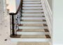 PURE ERA Bullnose Carpet Stair Treads set in beige textured finish on indoor wooden stairs.