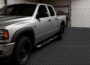 VEVOR Garage Floor Roll 4 x 7 ft heavy-duty PVC floor mat with black diamond-plate texture under a silver pickup truck
