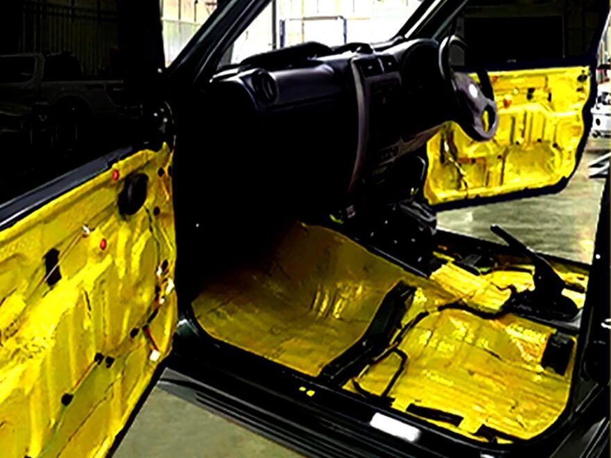 Mil sound deadening material for cars with heat insulation installed as gold foil sheets on doors and floor