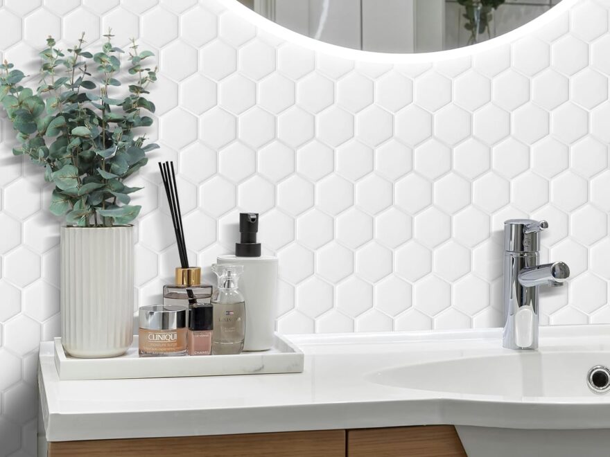 WalDecoo 10-Sheet Hexagon Peel and Stick Backsplash with white textured hex tiles behind bathroom sink
