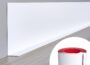 Duzzy flexible baseboard molding trim in white roll form with red adhesive backing, shown installed along a wall and floor