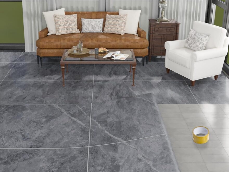 Freshtour PET leather-like vinyl flooring roll with gray textured tile finish, partially unrolled in a living room